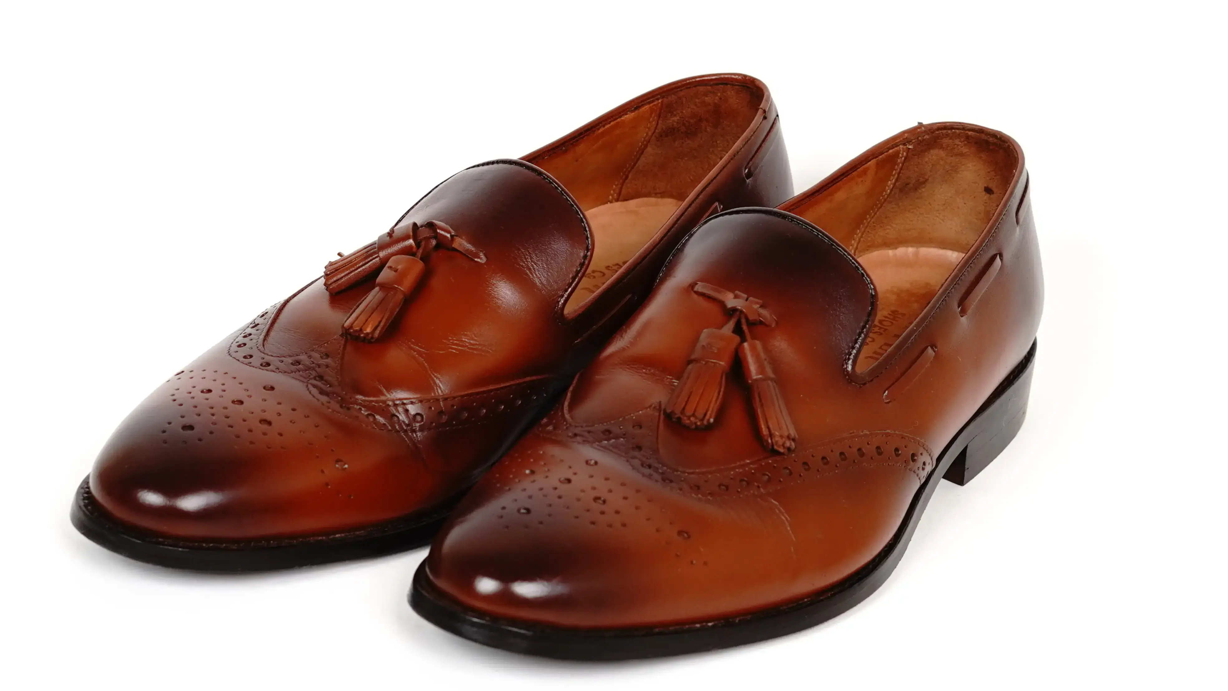 Before leather loafers colour restoration showing scuffed and faded surface