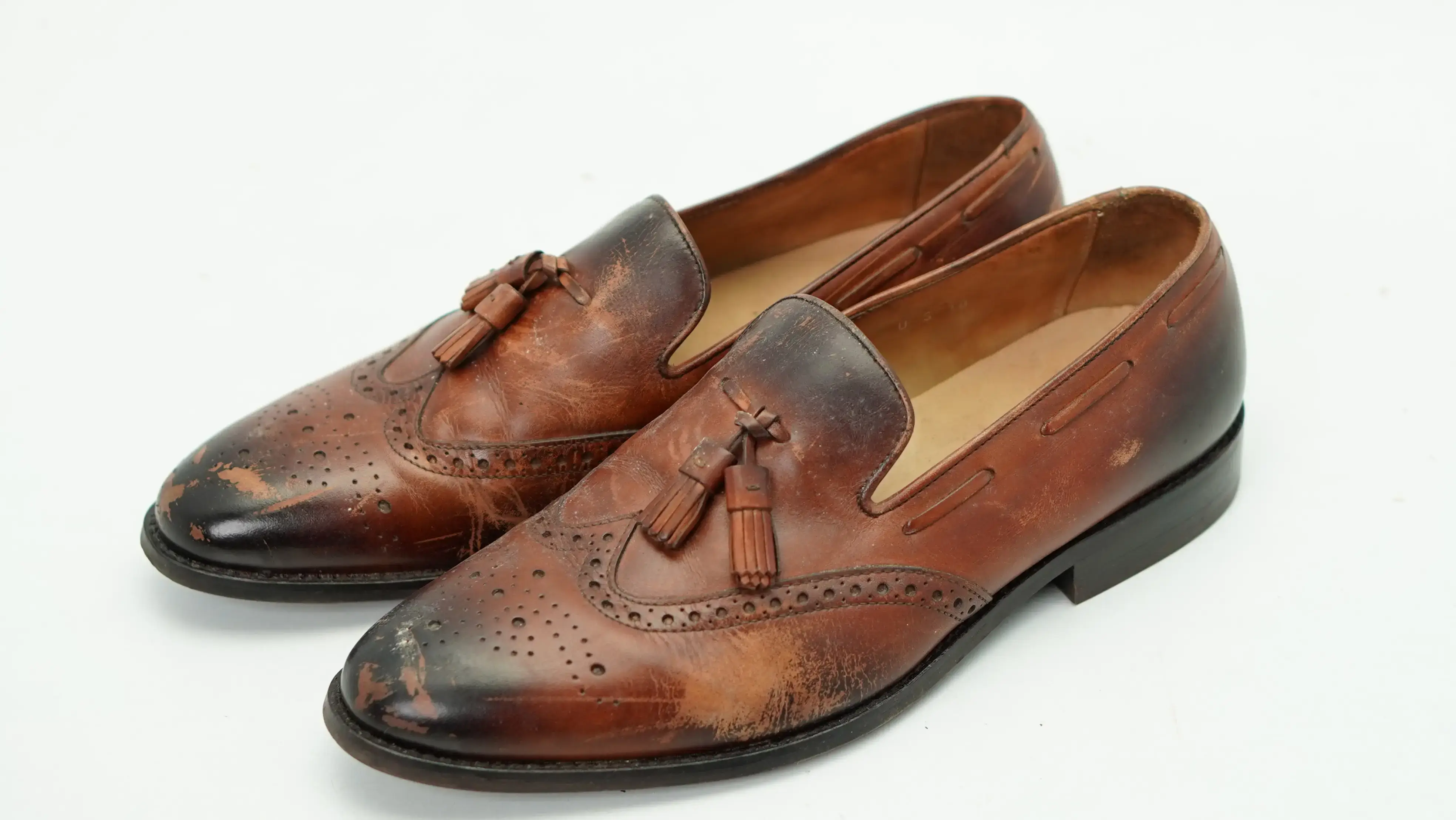 After leather loafers colour restoration with renewed tone and smooth finish