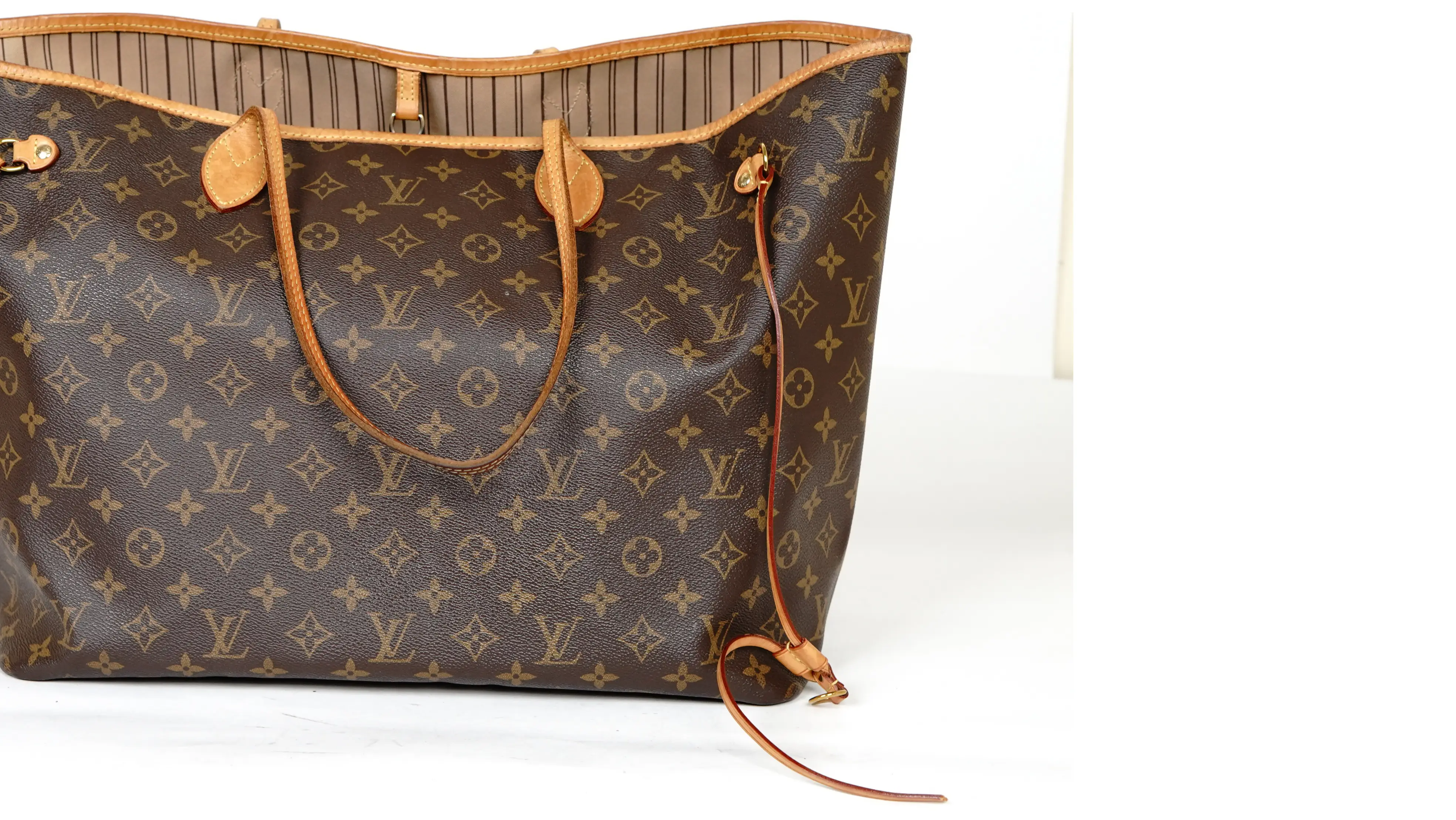 After Louis Vuitton tote restoration new genuine leather side strings replaced with precision finish